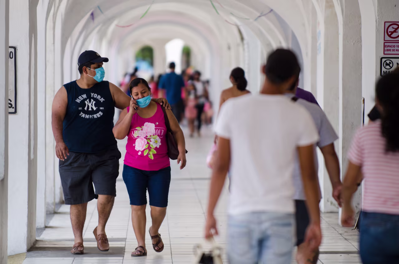 People walk around the center of Manzanillo, Mexico, on May 2.