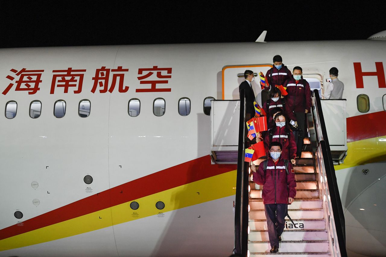 Medical specialists from China arrive at the Simon Bolivar International Airport in La Guaira, Venezuela, on March 30.