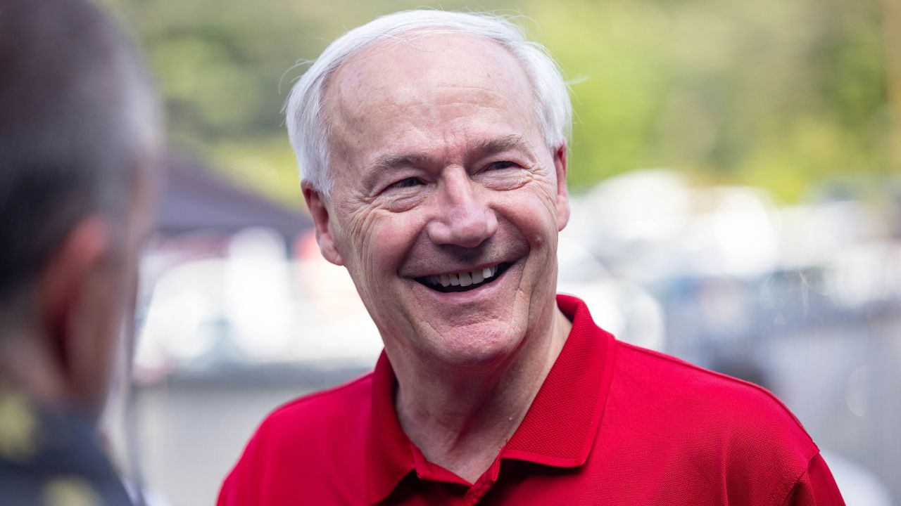 Republican presidential candidate and former Arkansas Gov. Asa Hutchinson smiles during a Labor Day Picnic on September 4, 2023, in Salem, New Hampshire. 