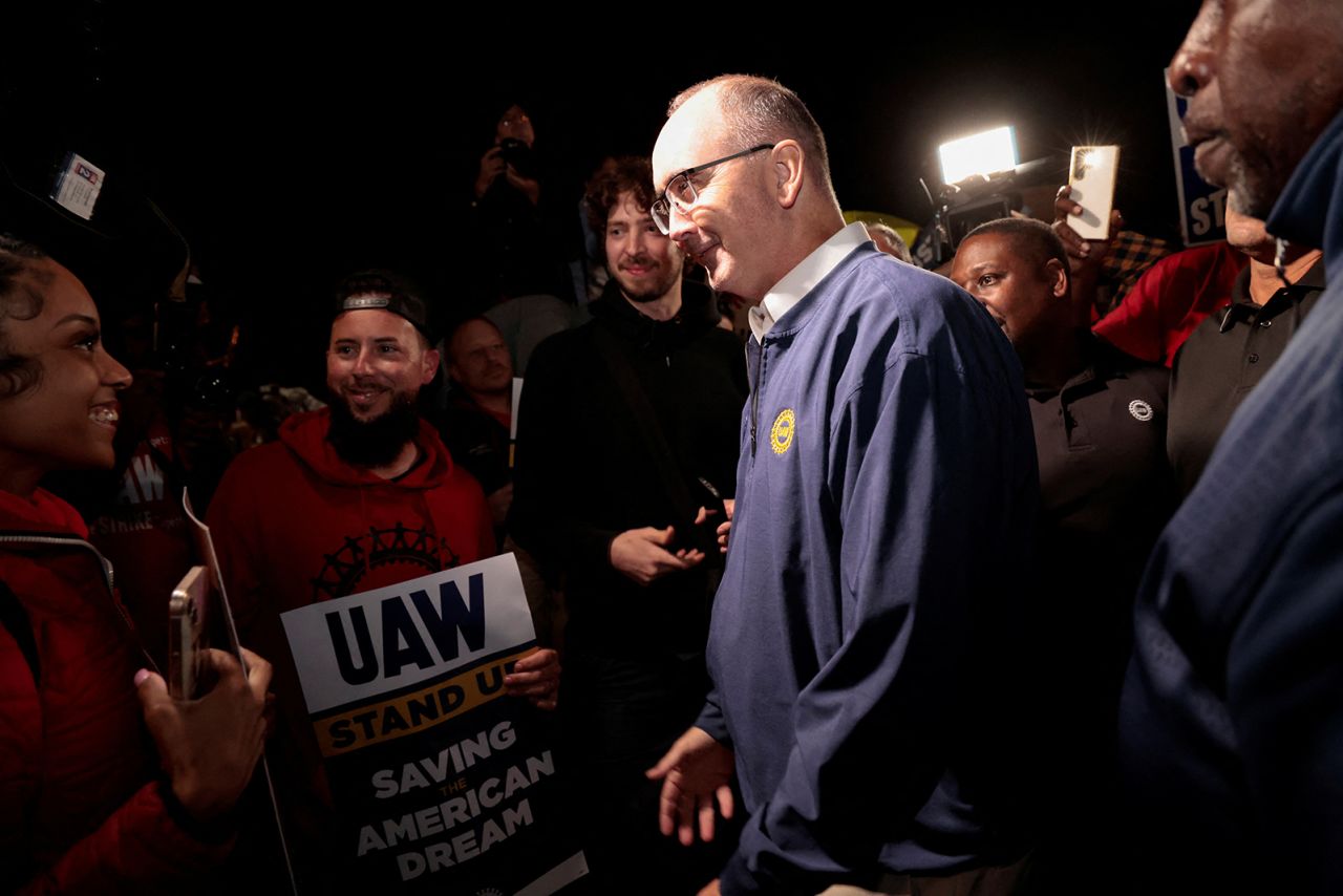 United Auto Workers union President Shawn Fain joins UAW members who are on a strike, on the picket line at the Ford Michigan Assembly Plant in Wayne, Michigan, on September 15.