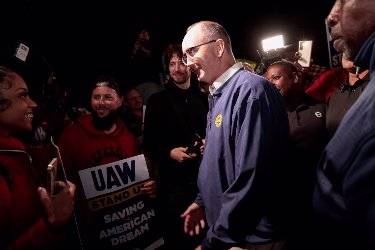 United Auto Workers union President Shawn Fain joins UAW members who are on a strike, on the picket line at the Ford Michigan Assembly Plant in Wayne, Michigan, on September 15.