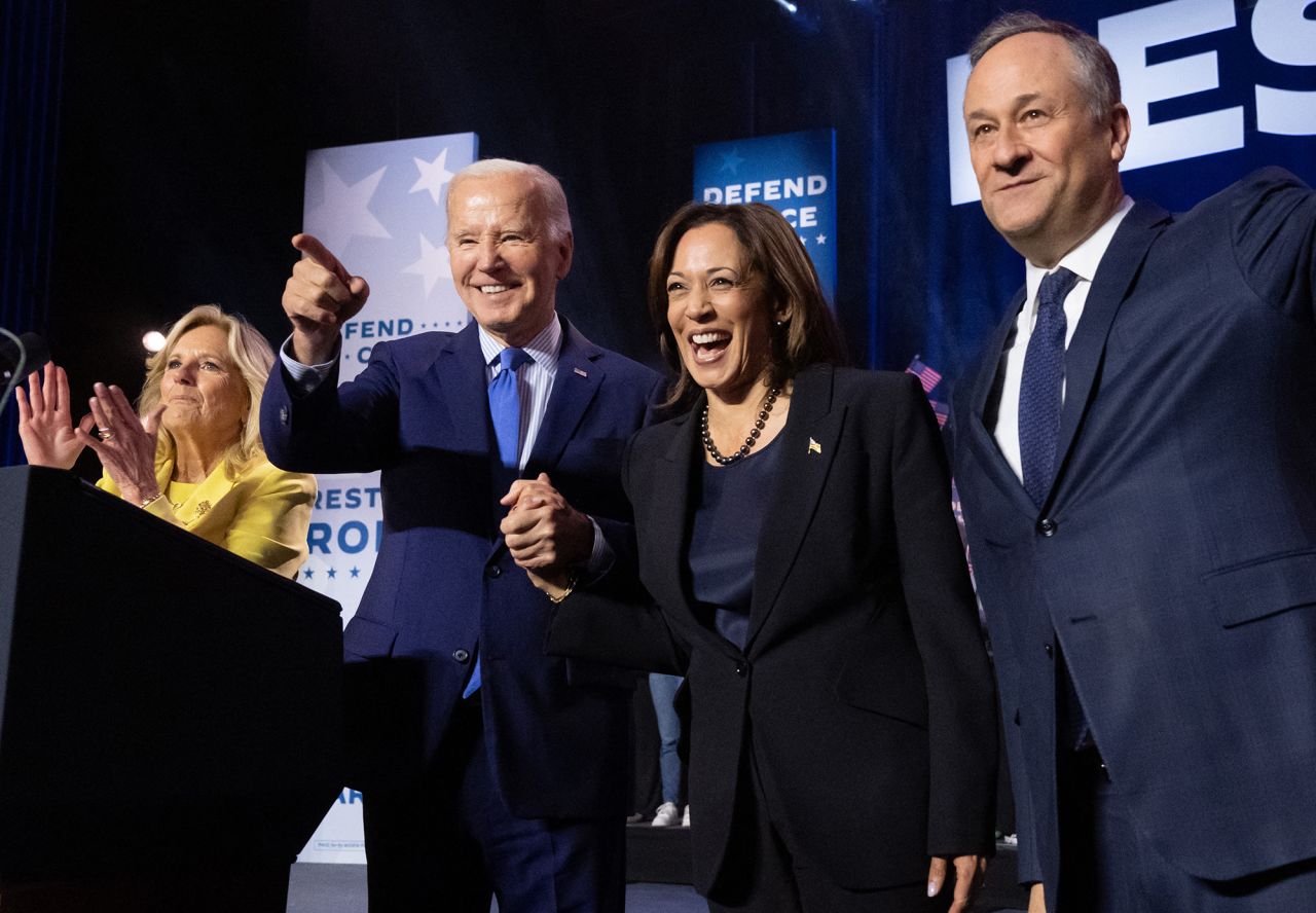 First lady Jill Biden, President Joe Biden, Vice President Kamala Harris and first gentleman Doug Emhoff wave following a campaign rally in Manassas, Virginia, on January 23. 