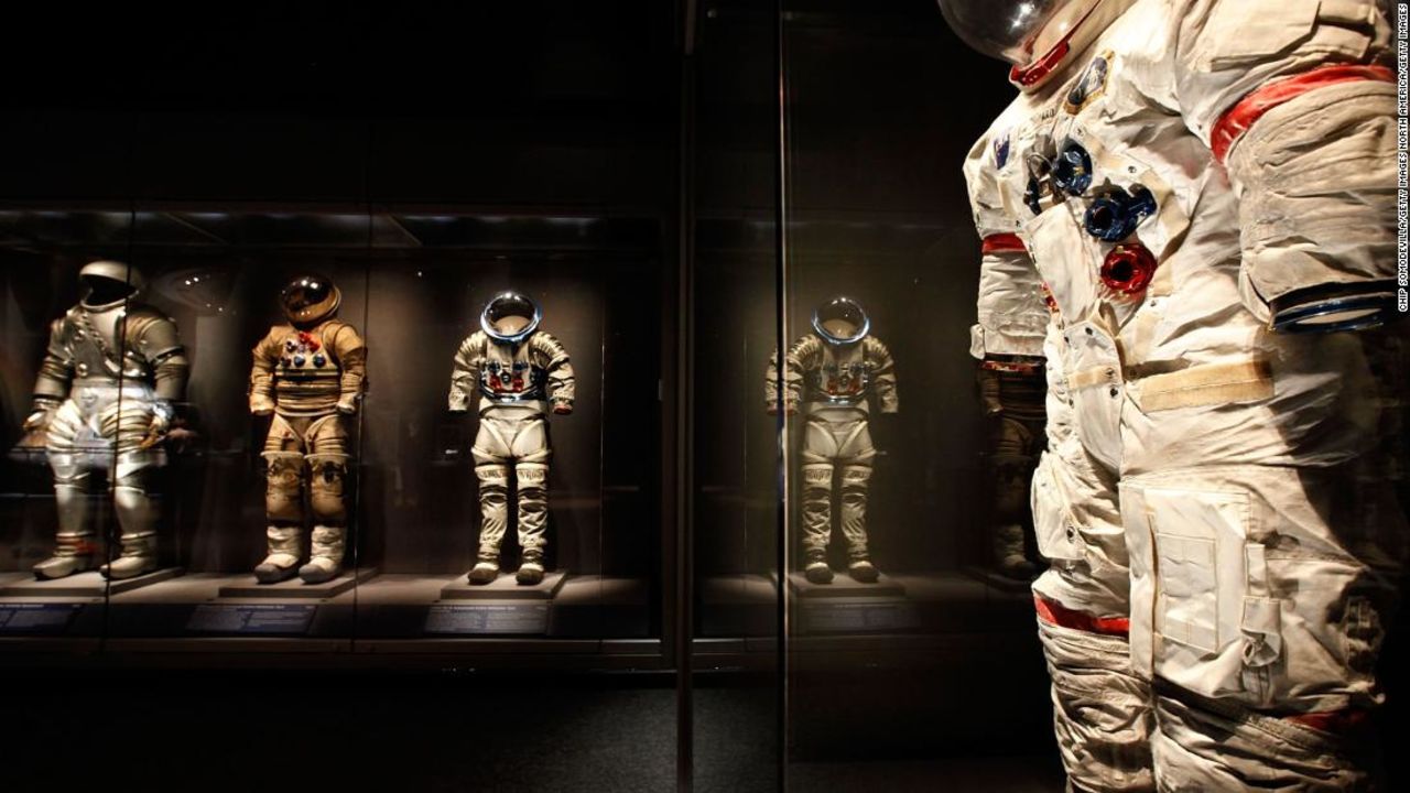 Several experimental prototypes of EVA (Extra Vehicular Activity) on display with a suit worn on the moon by Apollo 14 astronaut Alan Sheppard (R) in the Apollo Treasures Gallery at the Kennedy Space Center.