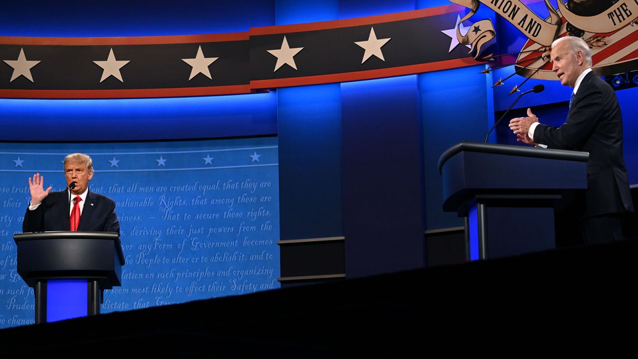 President Donald Trump and democratic presidential candidate Joe Biden gesture during the final presidential debate at Belmont University in Nashville on Thursday.