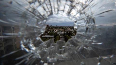 Mekelle, the regional capital of Tigray, in northern Ethiopia, is seen through a bullet hole at the Ayder Referral Hospital, in May 2021.
