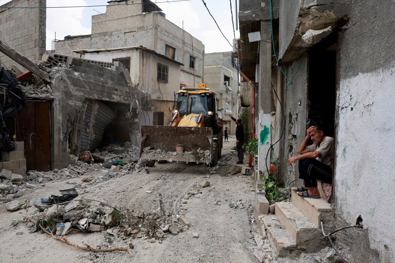 A Palestinian man reacts following an Israeli raid at the Nur al-Shams refugee camp in the occupied West Bank on April 21. 