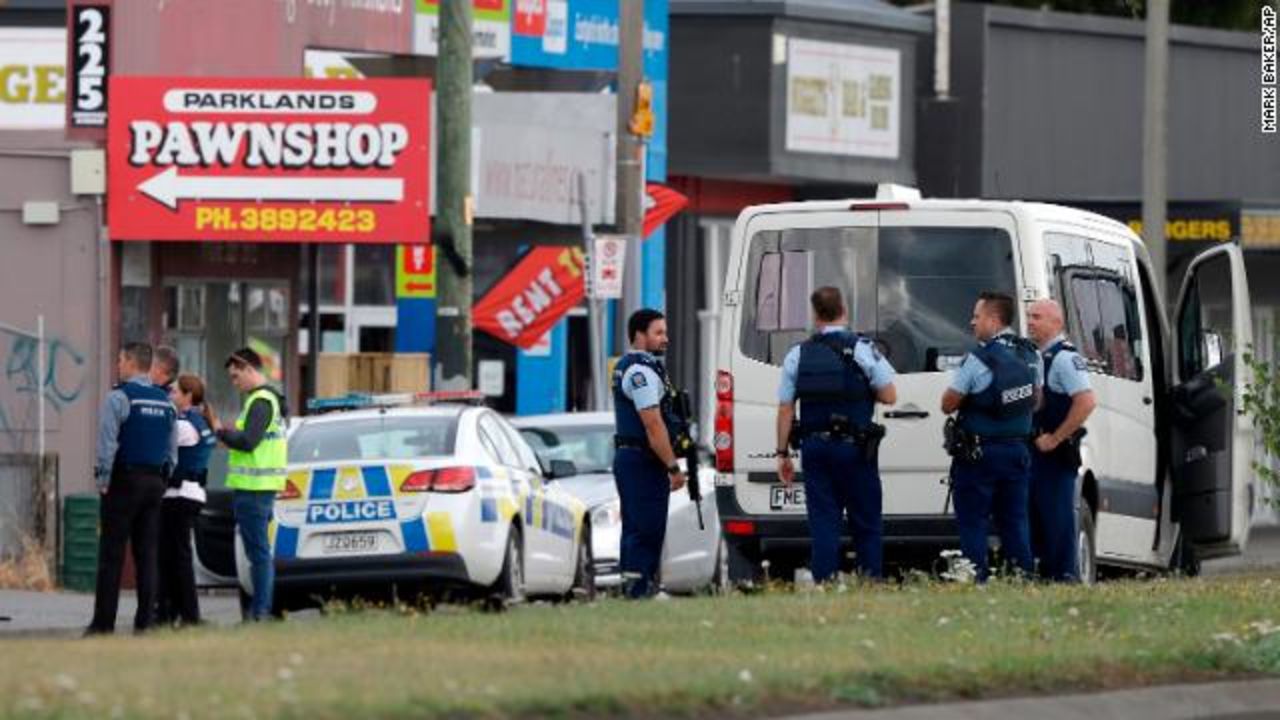 Police stand outside a mosque in Linwood in Christchurch, New Zealand, on March 15. Multiple people were killed during shootings at two mosques full of people attending Friday prayers. (AP/Mark Baker)