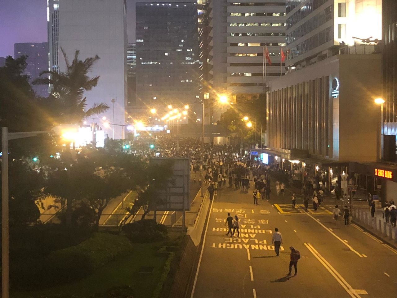 Crowds on Connaught Road leading to Central district. 