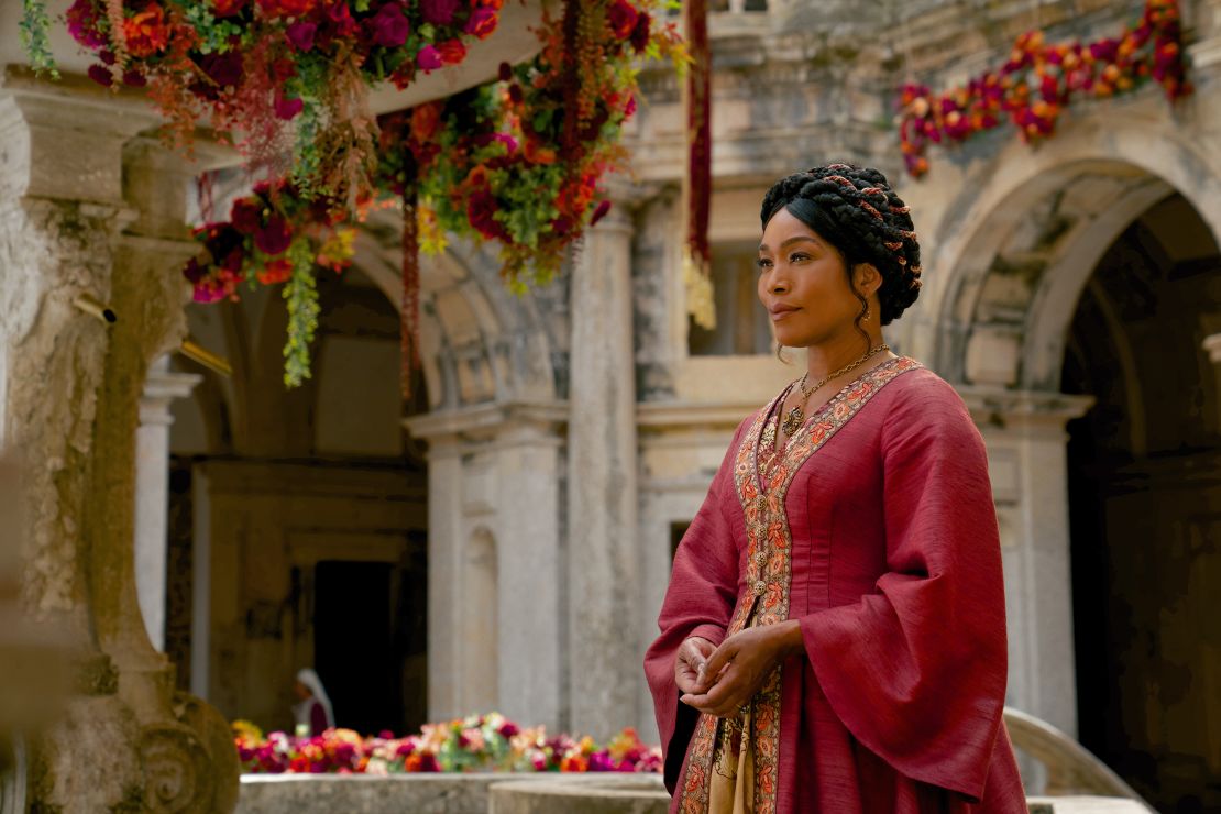 Angela Bassett co-stars as the princess' stepmother in 