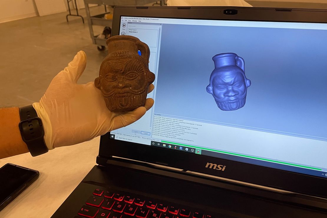 Researchers analyzed a 2,000-year-old Bes mug for chemical and DNA traces.