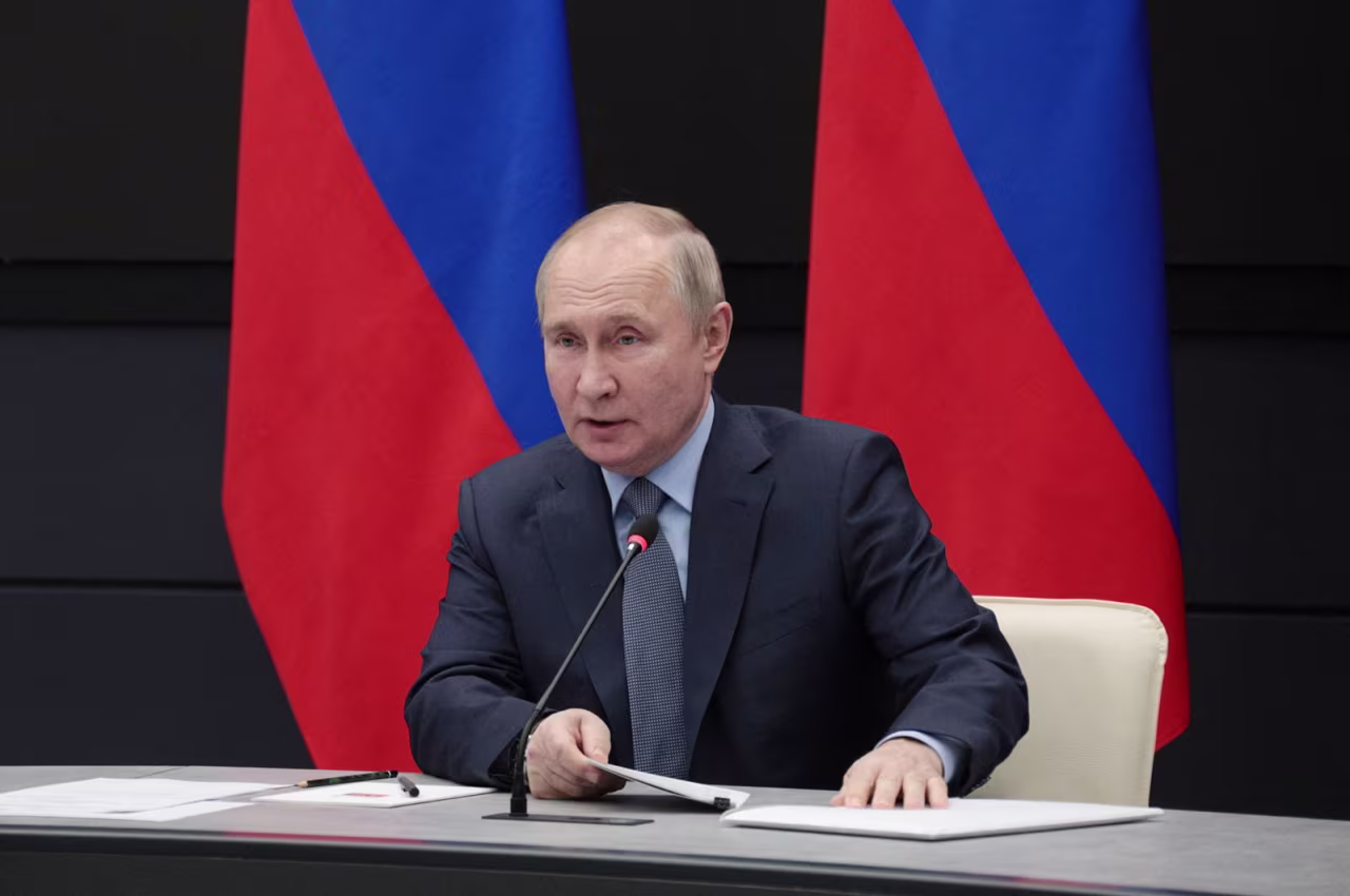 Russian President Vladimir Putin meets with defense industry officials in Tula, Russia, on December 23.