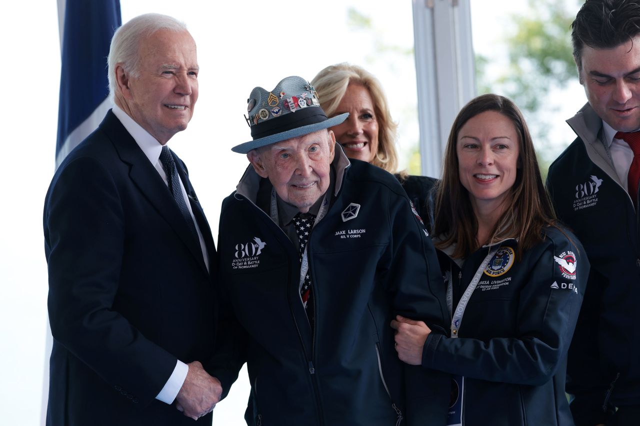 President Joe Biden greets American World War II veteran Jake Larson, before a ceremony marking the 80th anniversary of D-Day at the Normandy American Cemetery on June 6, in Colleville-sur-Mer, France.