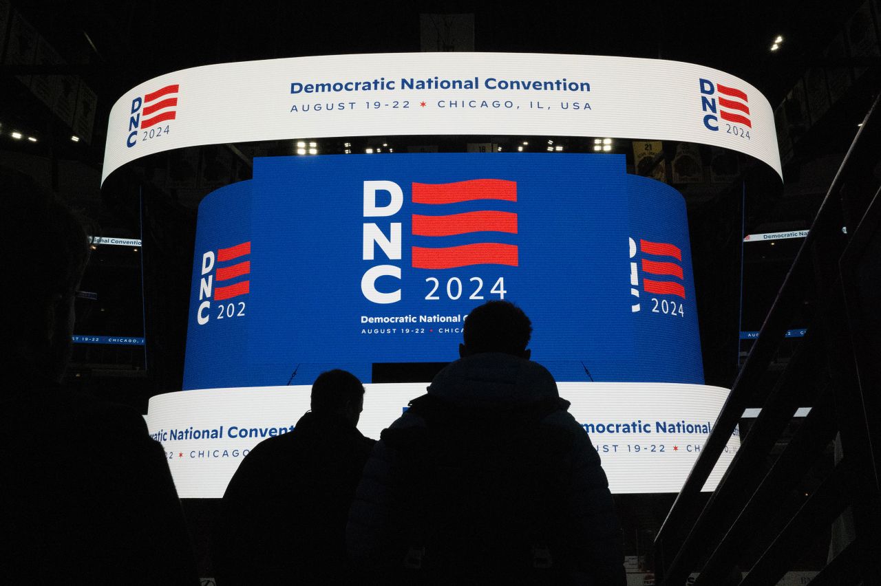 The logo for the Democratic National Convention is displayed on the scoreboard at the United Center during a media walkthrough on January 18 in Chicago.