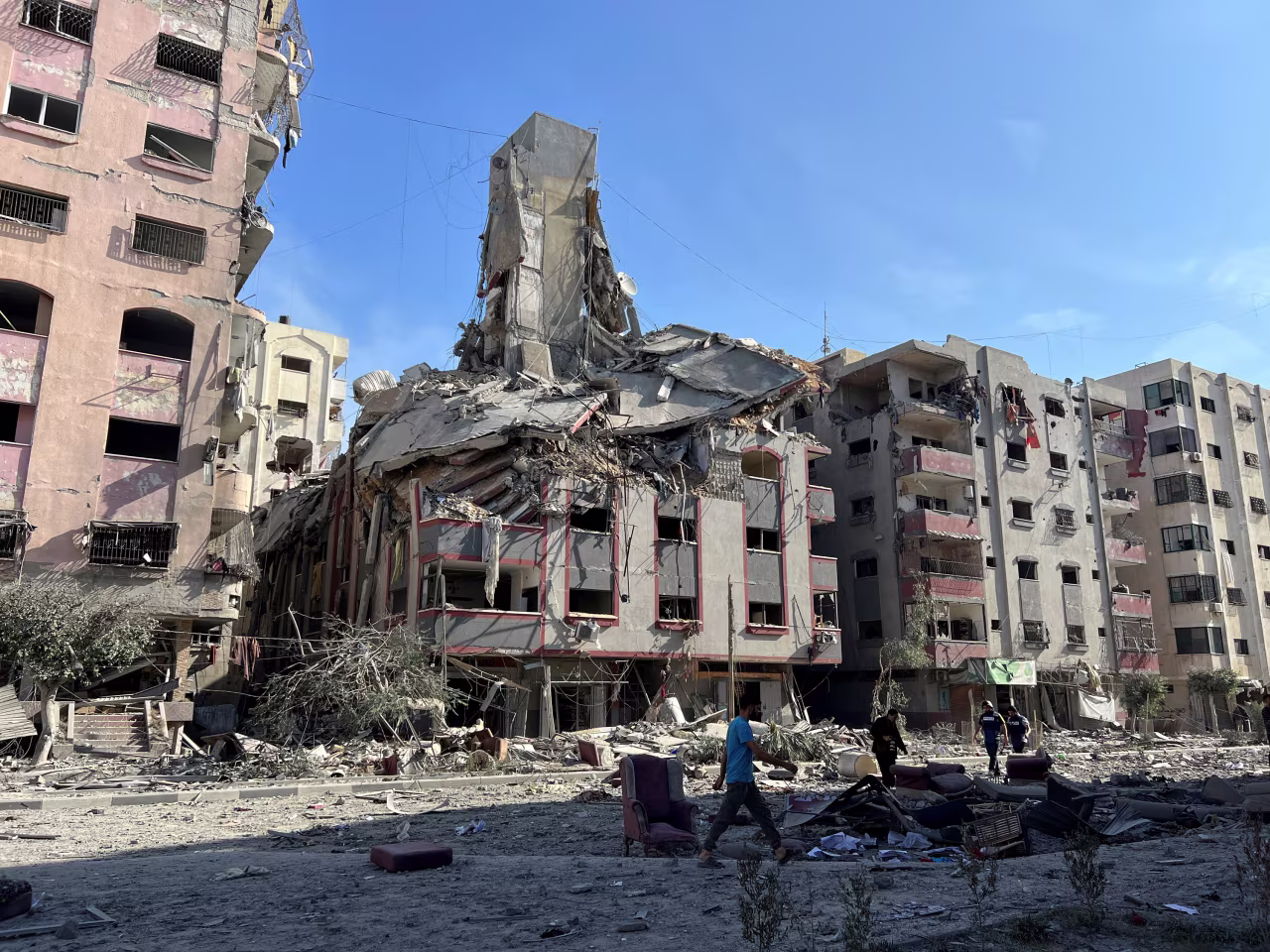 Damaged residential buildings are seen near Al-Quds hospital in Gaza City, on October 30.