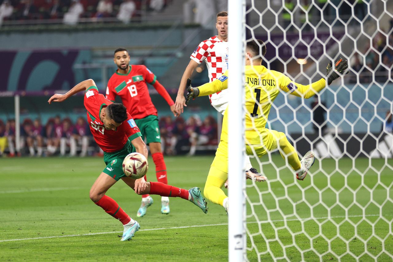 Morocco’s Achraf Dari heads the ball to score against Croatia on Saturday. 