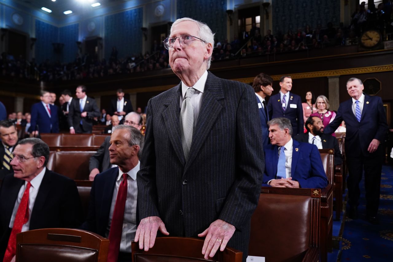 Senate Minority Leader Mitch McConnell stands on the House floor ahead of the annual State of the Union address.