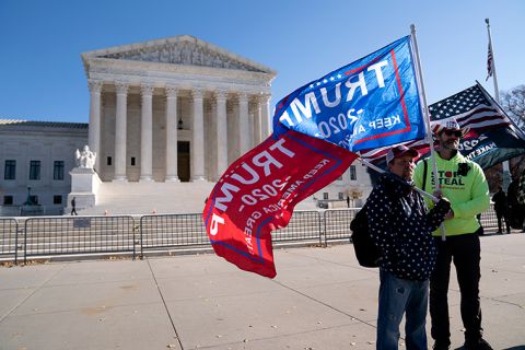 Supporters of US President Donald Trump gather outside of the US Supreme Court on Friday, December 11.