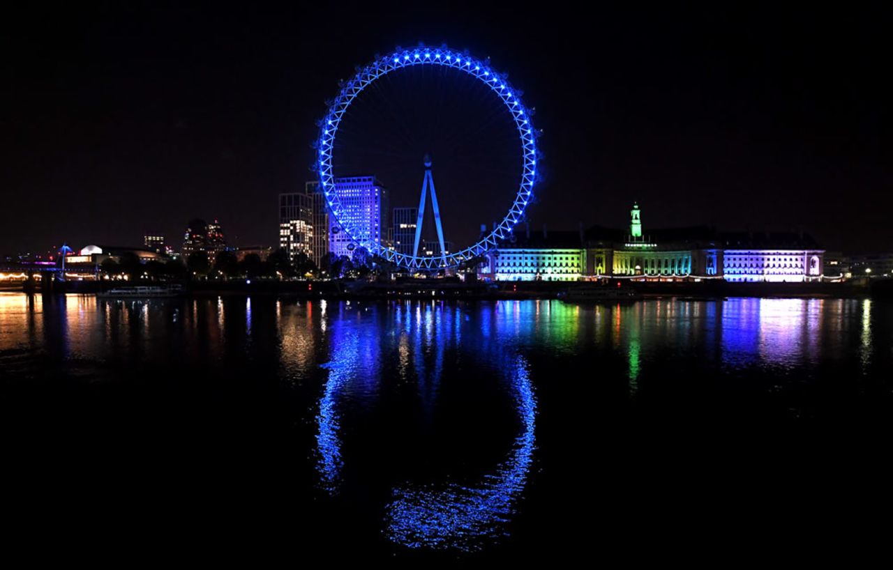 The London Eye is seen lit up blue in appreciation for the National Health Service on April 23 in London.