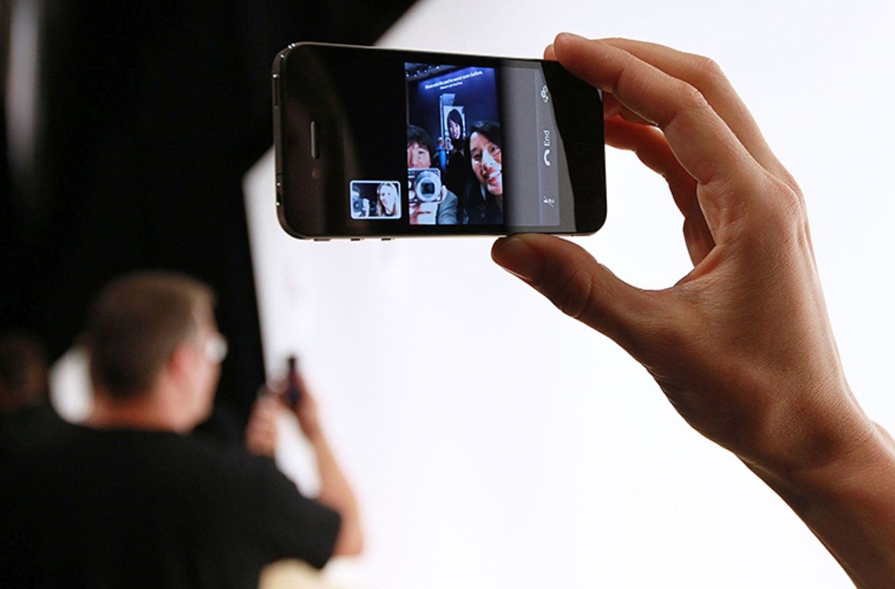 An Apple employee demonstrates "Face Time" on the new iPhone 4 at the 2010 Apple World Wide Developers conference on June 7, 2010 in San Francisco, California.