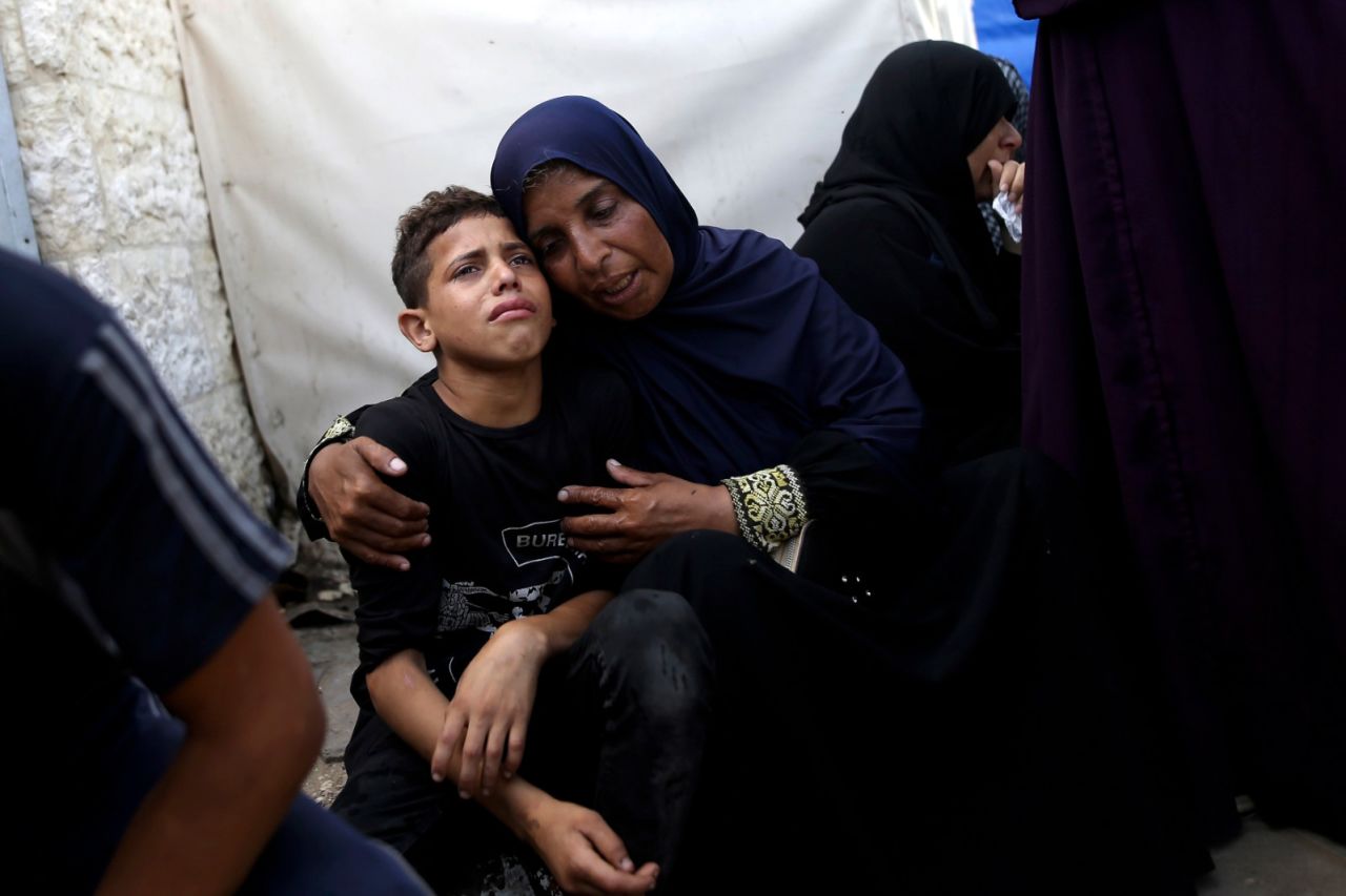 Palestinians mourn relatives killed in the Israeli bombardment in Deir al-Balah, Gaza, on June 8. 