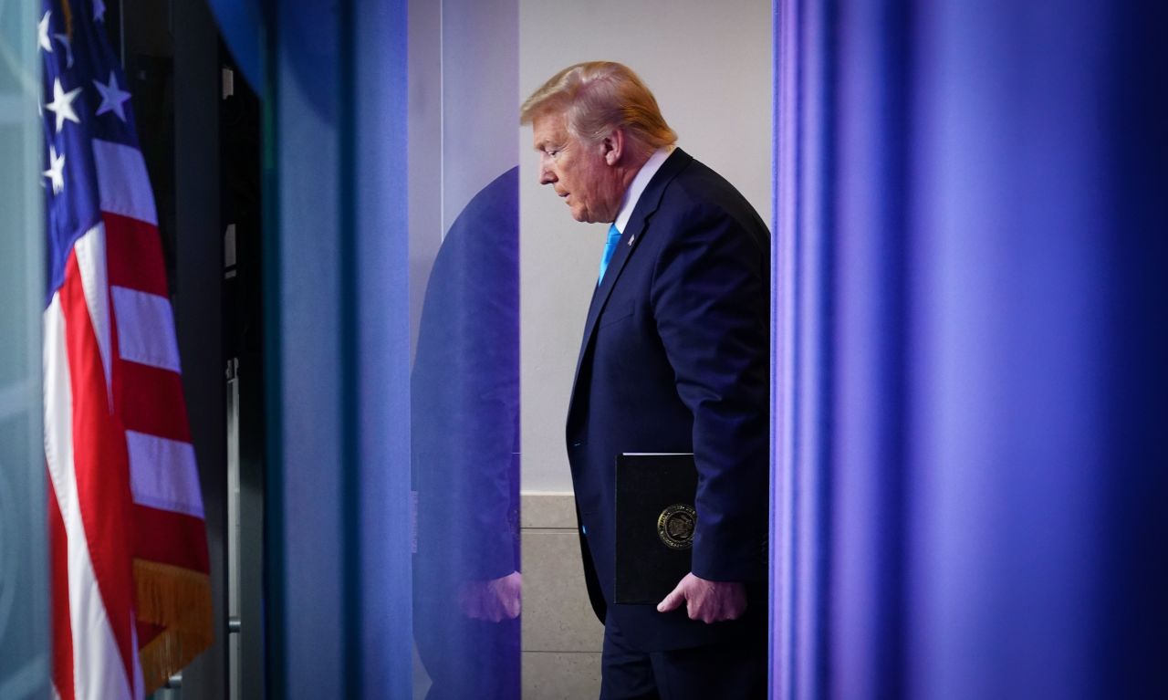 President Donald Trump arrives for a daily briefing on the novel coronavirus at the White House on April 7.