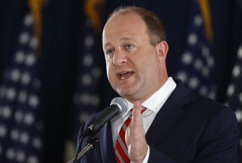 Colorado Gov. Jared Polis talks during a news conference on the state's efforts against the spread of the coronavirus in Denver, on Tuesday, May 26. 