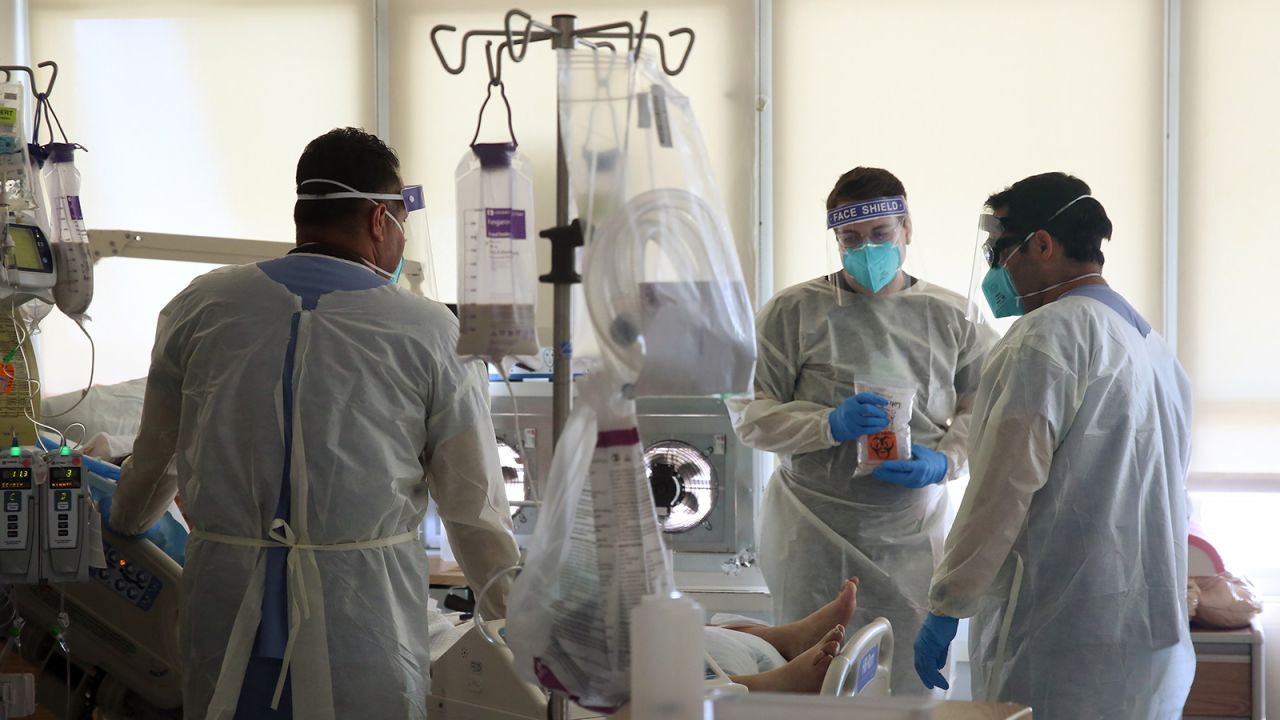 Hospital doctors and nurses treat Covid-19 patients in a makeshift ICU wing on the West Oeste at Harbor UCLA Medical Center on Tuesday, December 29 in Torrence, California.