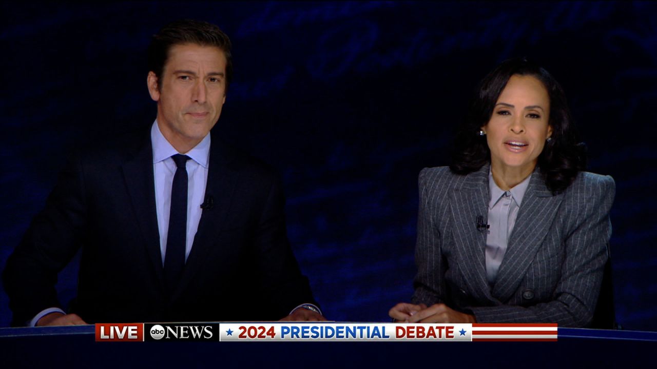 ABC News moderators David Muir and Linsey Davis speak at the start of the debate between Vice President Kamala Harris and former President Donald Trump.