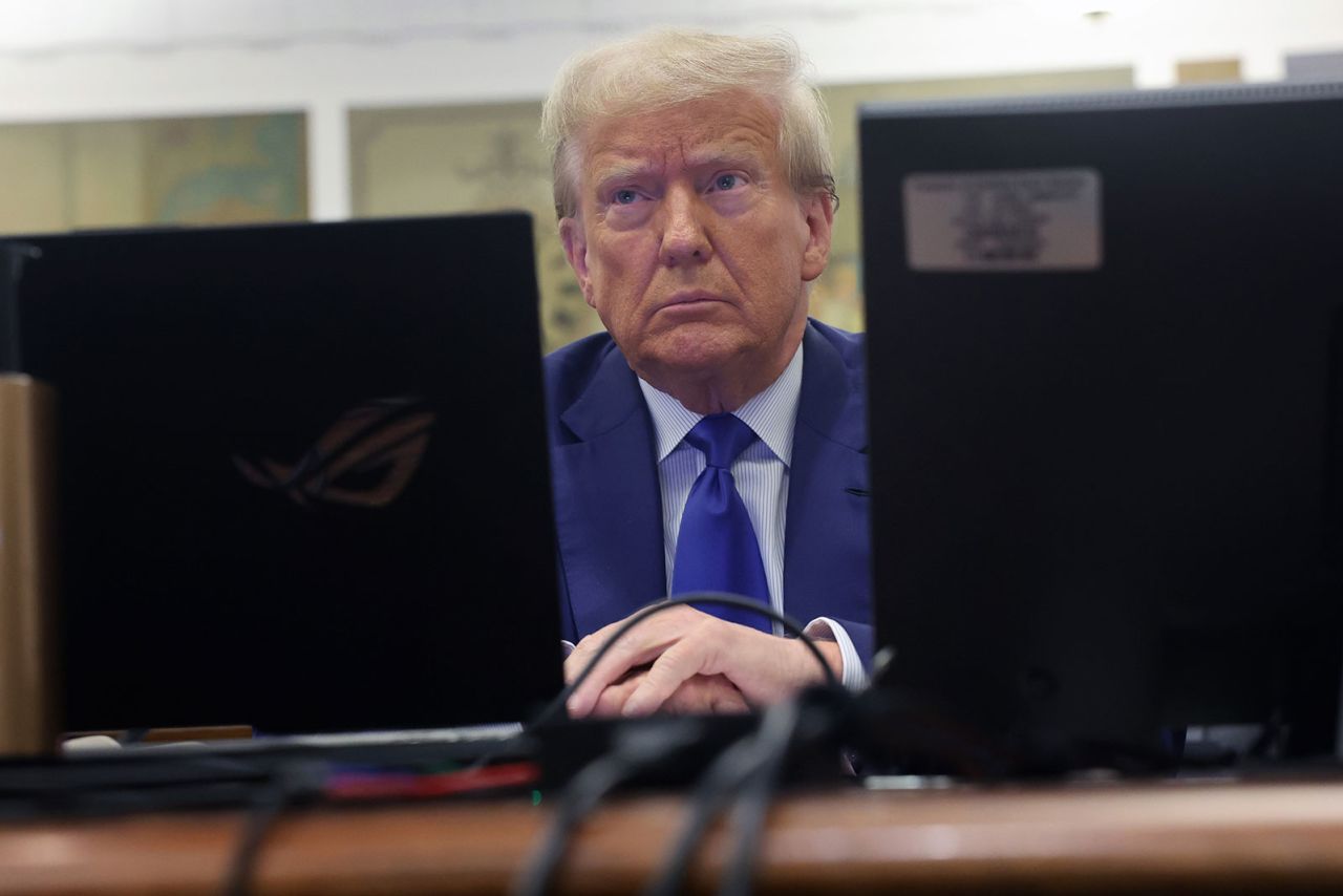 Former President Donald Trump sits in court prior to the continuation of his civil fraud trial on Wednesday.