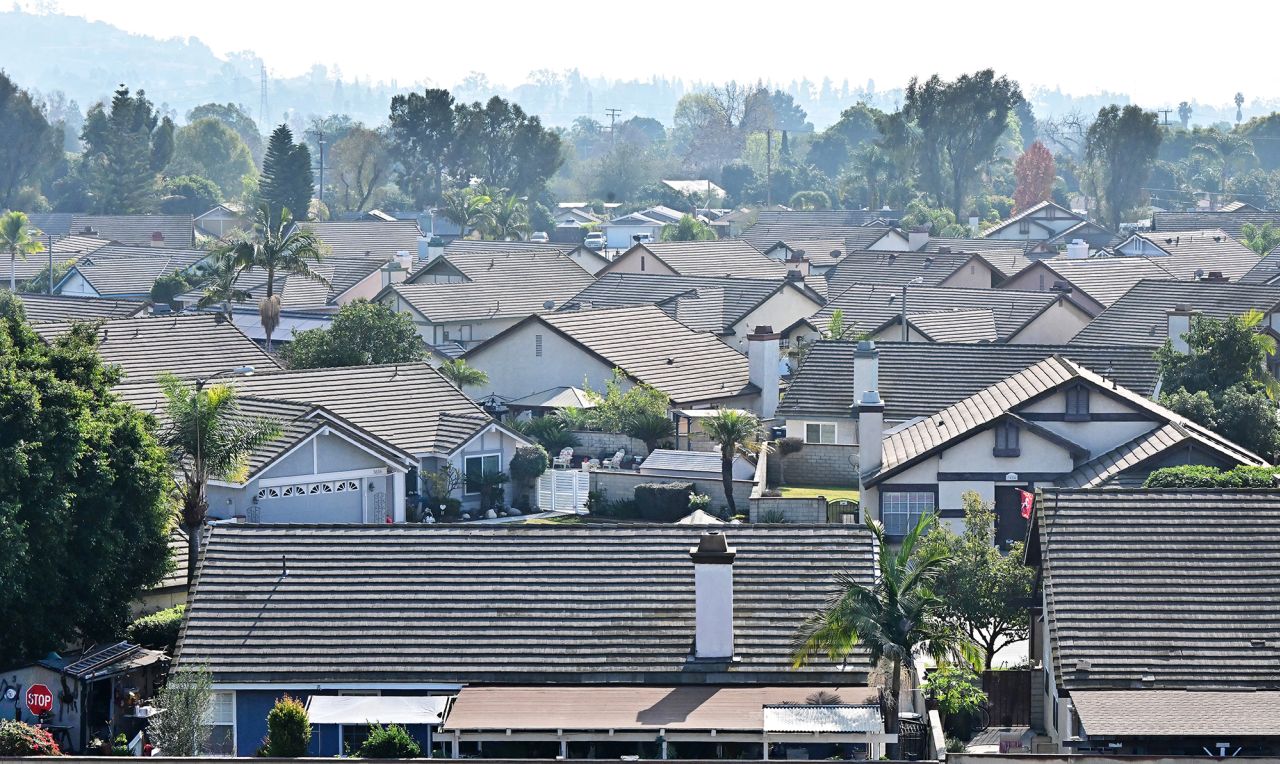 Rooftops of homes in a gated residential community are seen in Pico Rivera, California on January 18, 2024.