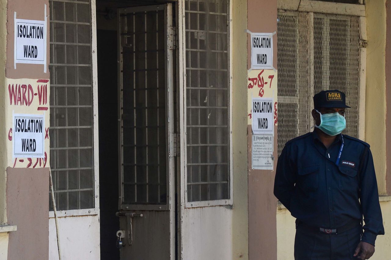 A security guard stands outside a preventive isolation ward for patients arriving from Hong Kong at a government hospital in Hyderabad, India, on January 27