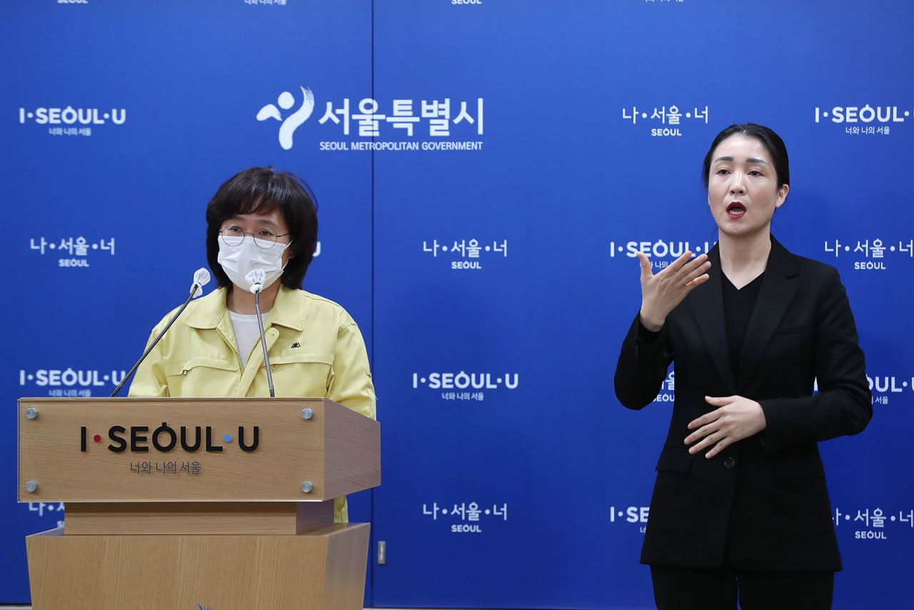 Park Yoo-mi, a senior quarantine official at the Seoul city government, announces anti-Covid-19 steps and new restrictions at Seoul City Hall in Seoul, South Korea, on November 18.