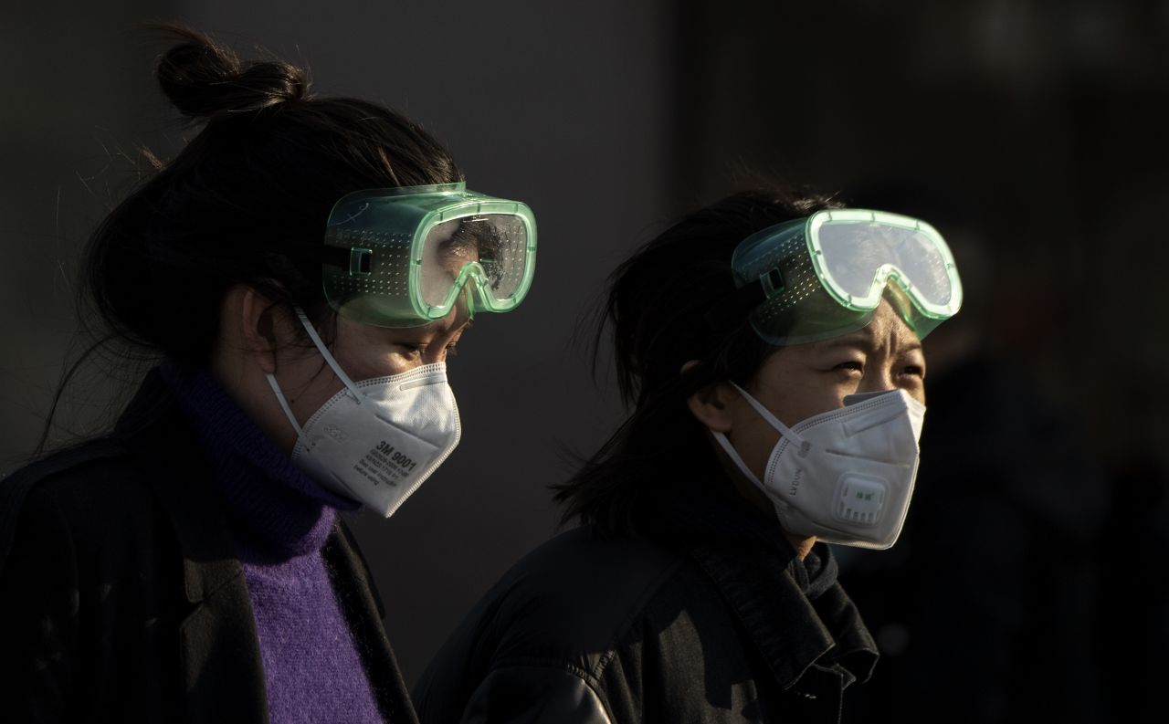 Travellers arriving at the Beijing Railway Station on February 3, 2020.