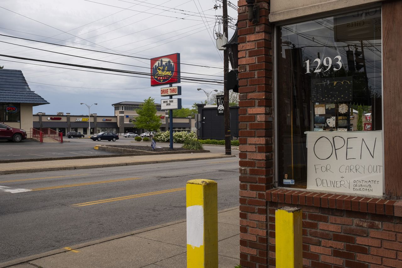 A restaurant offering takeout only stands in Louisville, Kentucky, on Saturday, April 25.