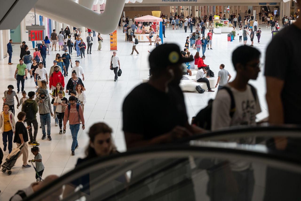 People walk and shop in a lower Manhattan shopping mall on September 13 in New York City.?