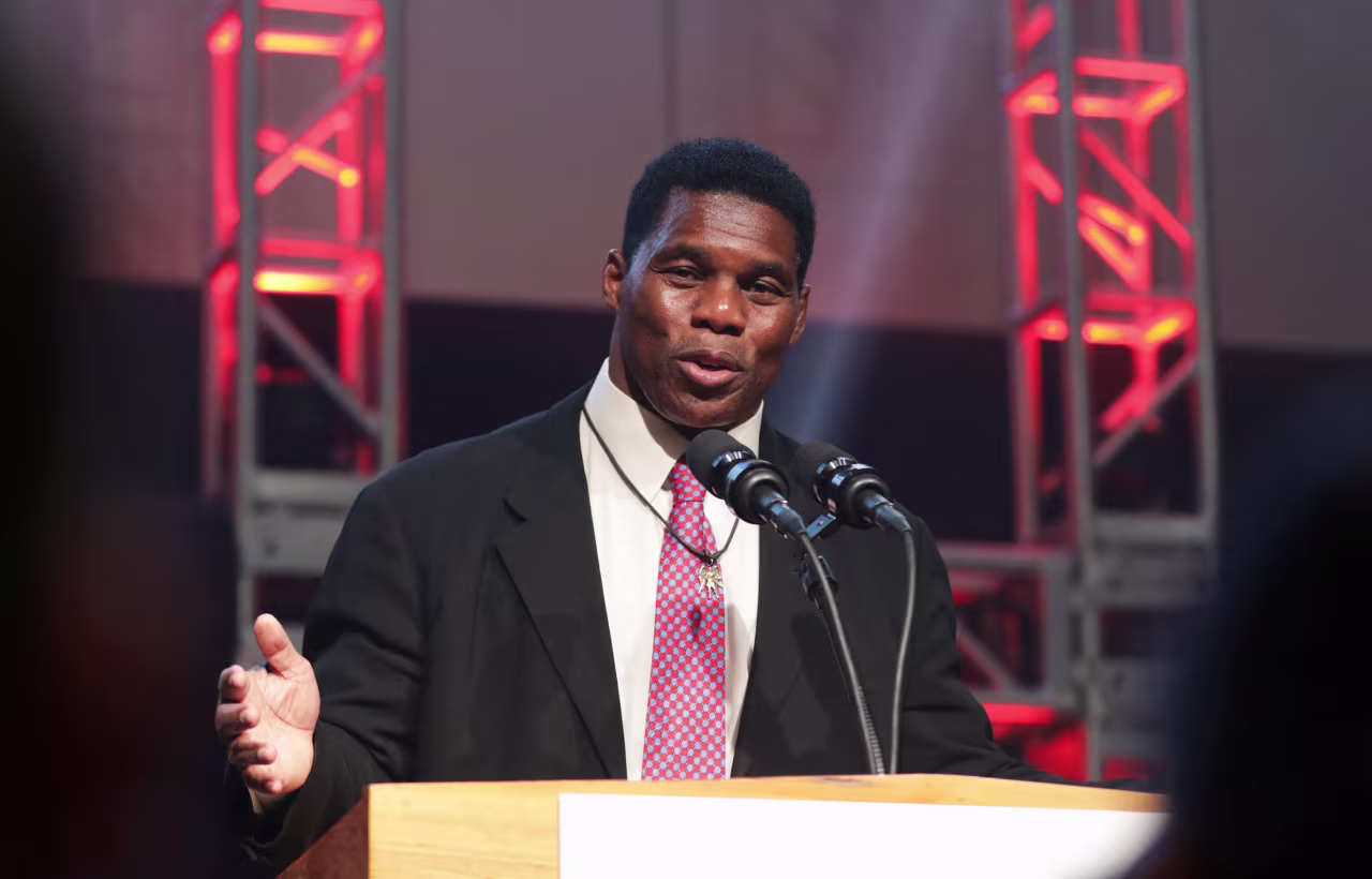 Herschel Walker speaks during an election night party in Atlanta on Tuesday.