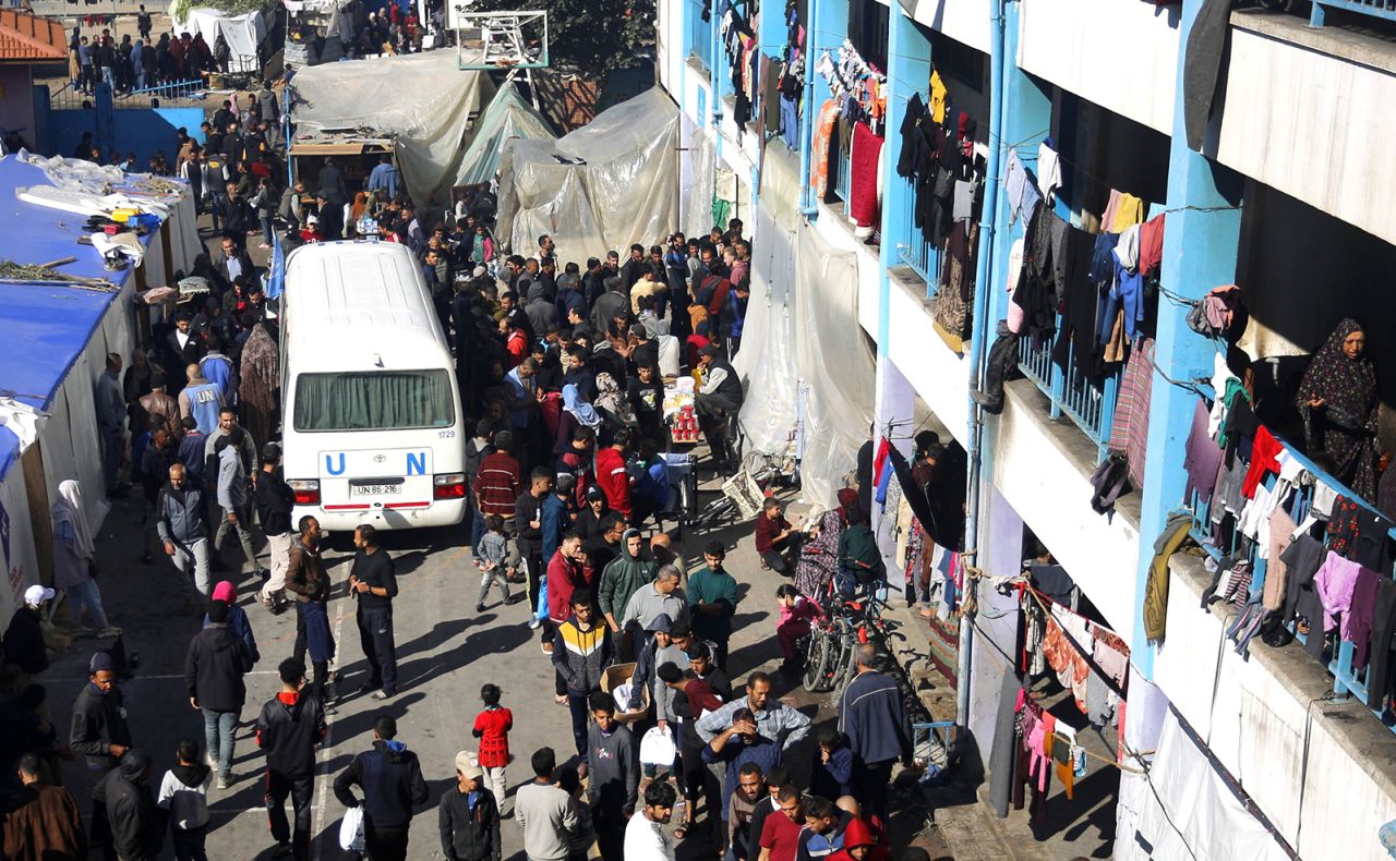 Palestinian families who lost their homes take shelter at a United Nations Relief and Works Agency in the Near East (UNRWA) school, in Deir al-Balah, Gaza on December 17.