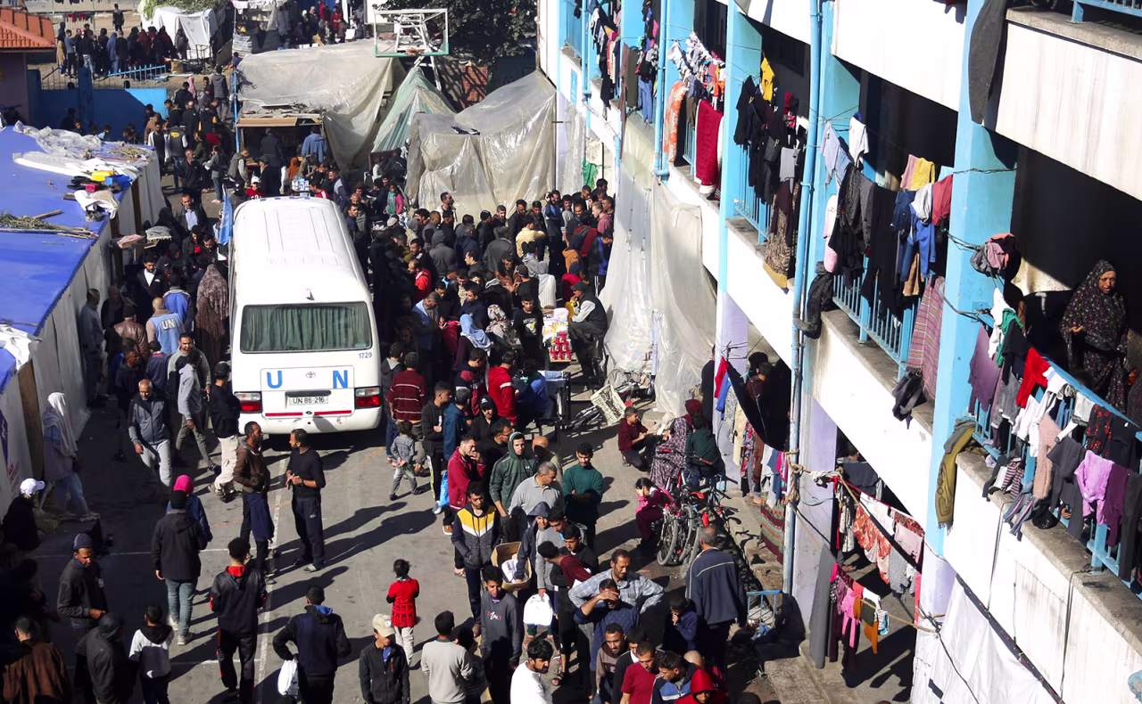 Palestinian families who lost their homes take shelter at a United Nations Relief and Works Agency in the Near East (UNRWA) school, in Deir al-Balah, Gaza on December 17.