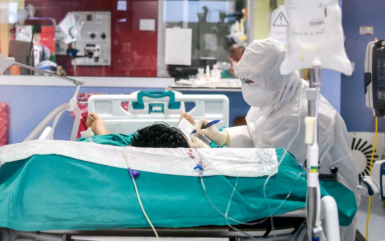 A medical worker tends to a patient in the ICU of the Bassini Hospital, in Cinisello Balsamo, Italy, on April 14.