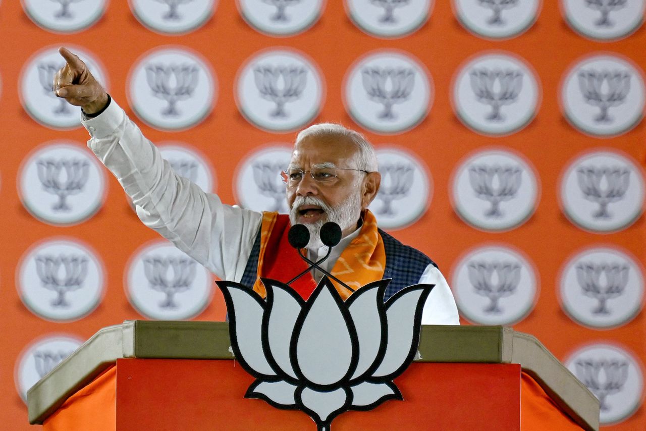 Narendra Modi addresses his supporters during a public meeting in Hyderabad on May 10.