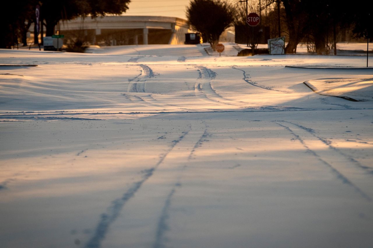 Snow covers the streets after a storm Monday, February 15, in Fort Worth, Texas.