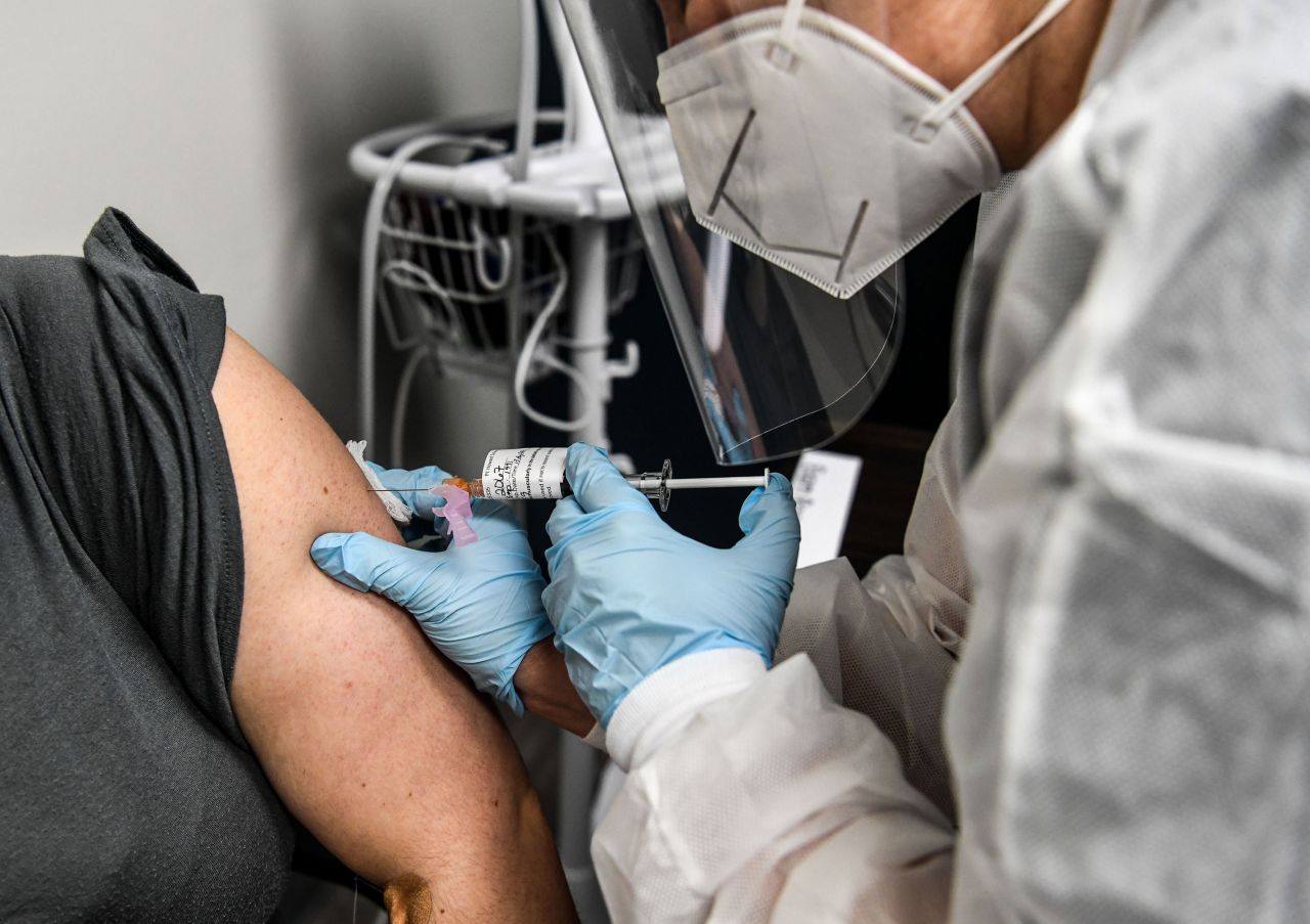 A patient receives a coronavirus vaccine as part of a study at the Research Centers of America on August 13 in Hollywood, Florida. 