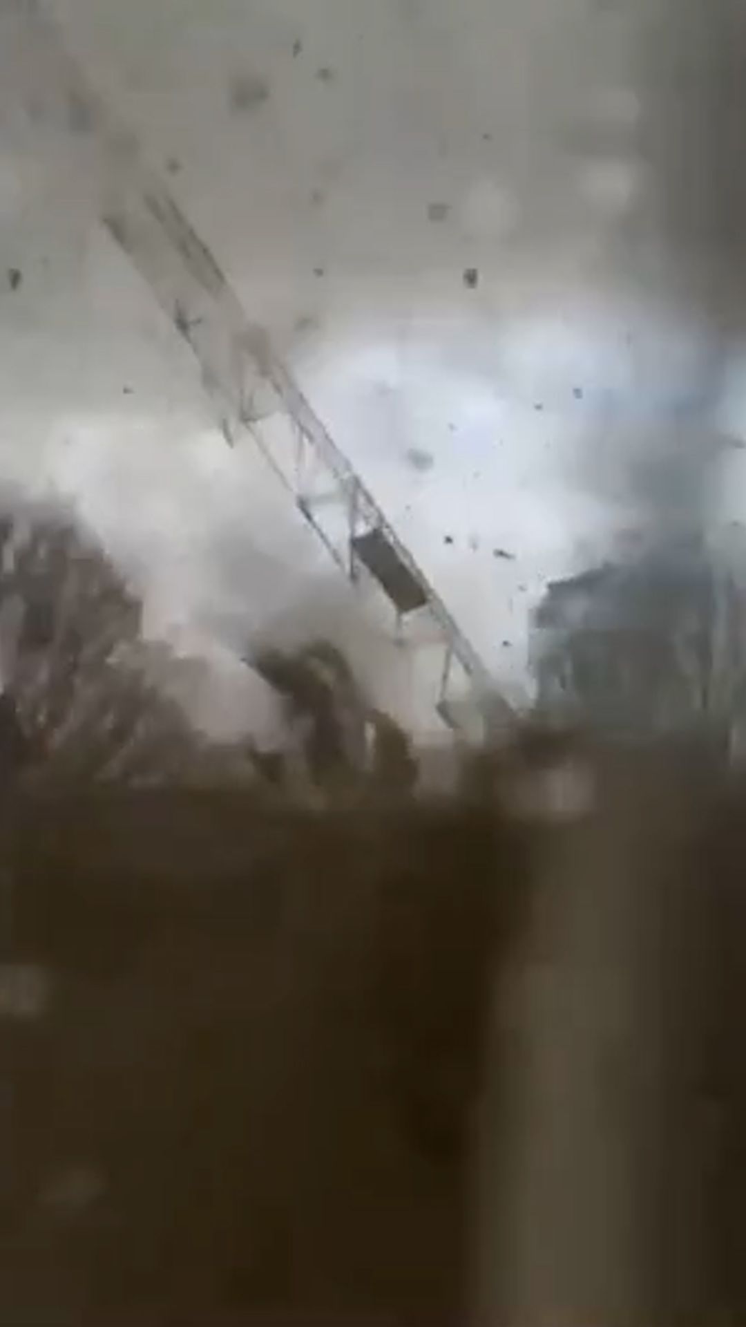 Deadly tornado topples cranes-CL-VRTC.jpg