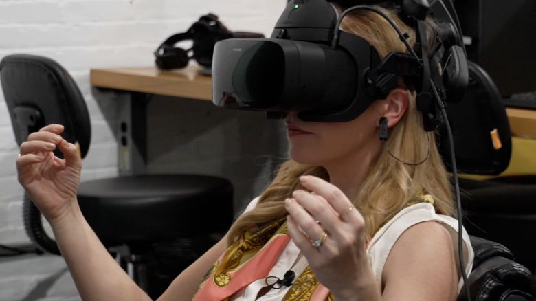 CNN's Anna Stewart tries on OpenBCI's Galea headset