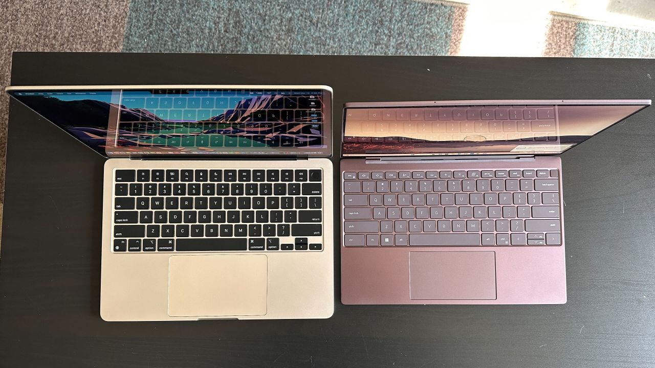 Both laptops boast terrific portability, but the Dell XPS 13 (right) has the edge because it wastes no space in its smaller design.