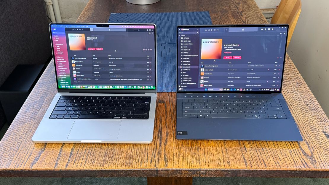 (L, R) Apple MacBook Pro 14 and XPS 14 with the Apple Music app open to "a sound check" playlist.