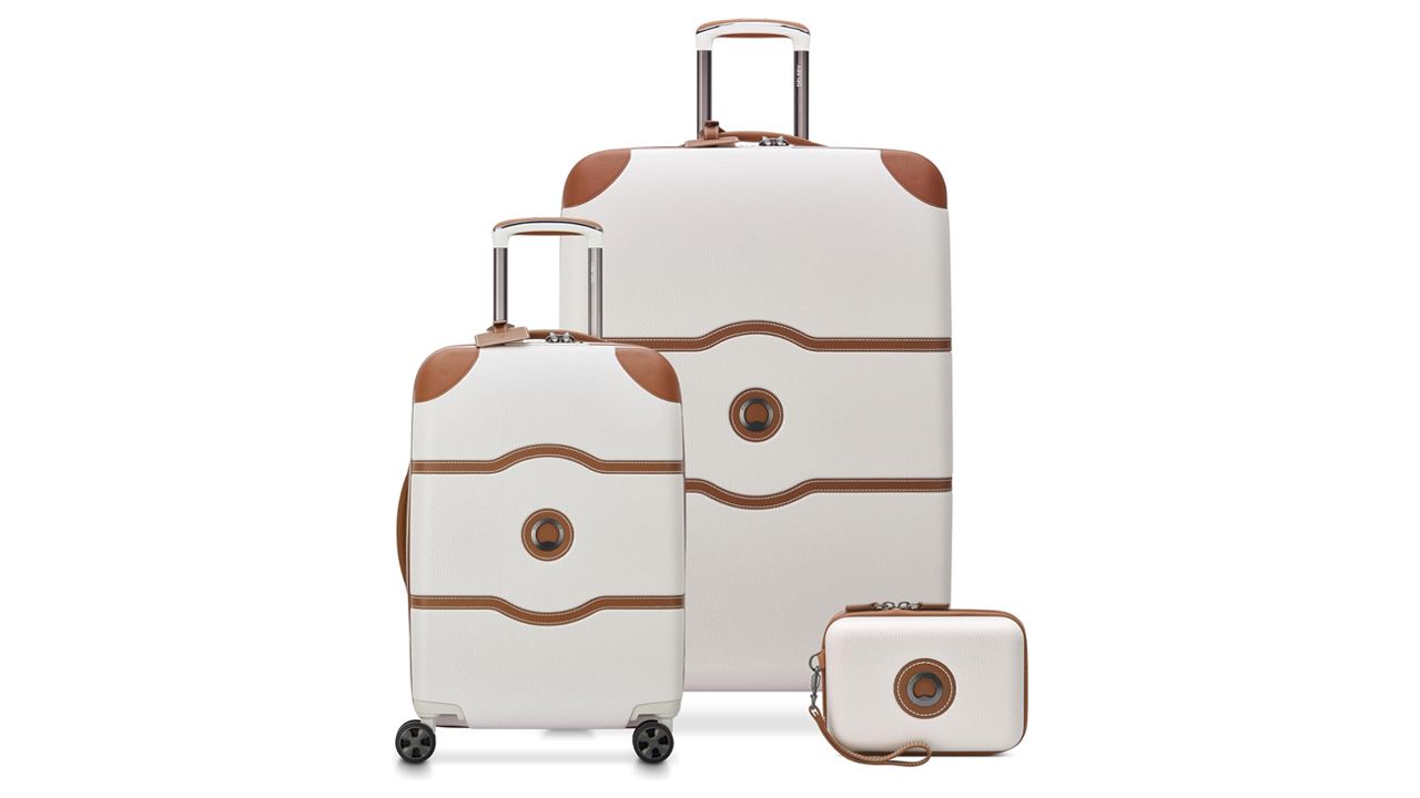 A photo of a three-piece set of Delsey Paris luggage