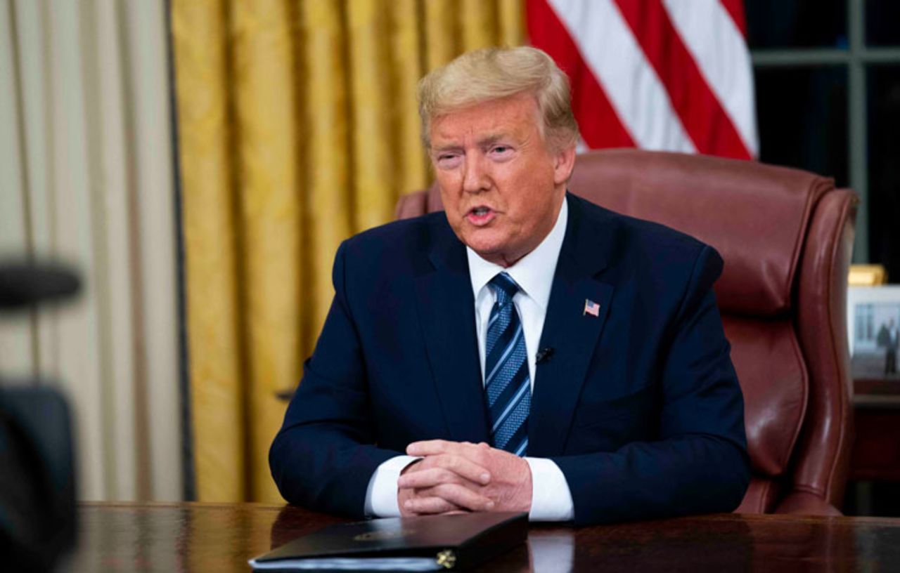 US President Donald Trump addresses the nation from the Oval Office about the widening Coronavirus crisis on March 11, in Washington, DC. 