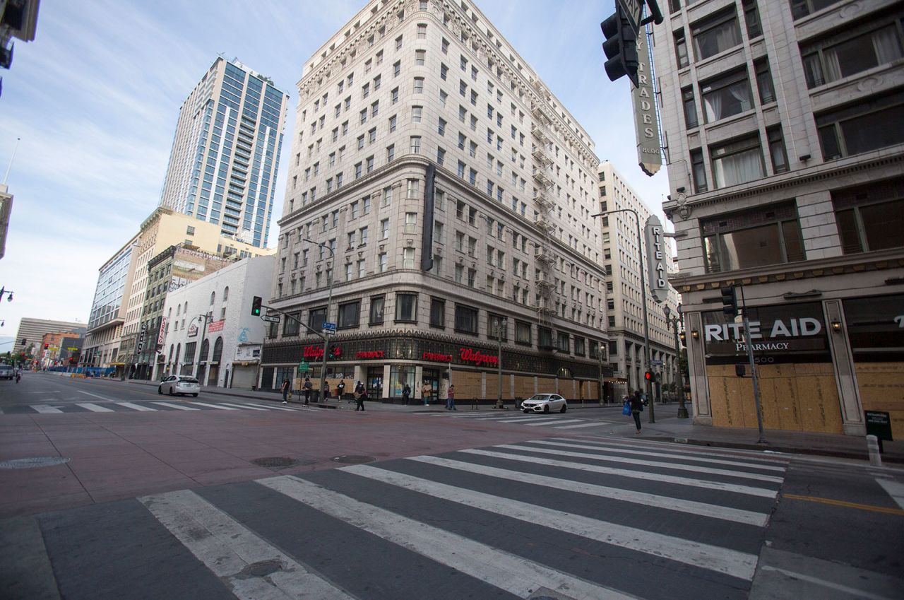 A nearly empty street corner in downtown Los Angeles on Sunday, May 31.