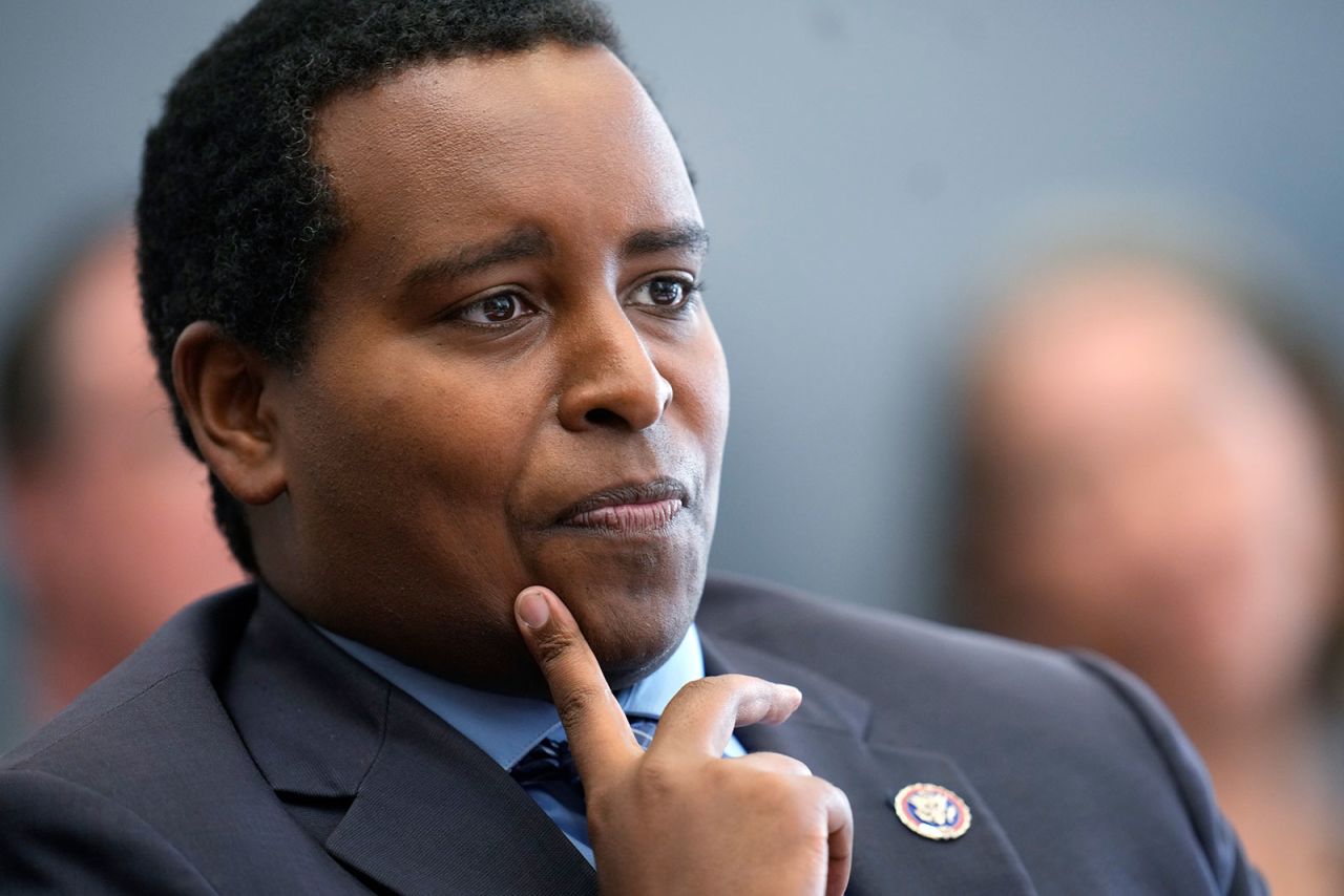 Rep. Joe Neguse listens during a news conference at the National Center for Atmospheric Research in Boulder, Colorado, on August 31. 